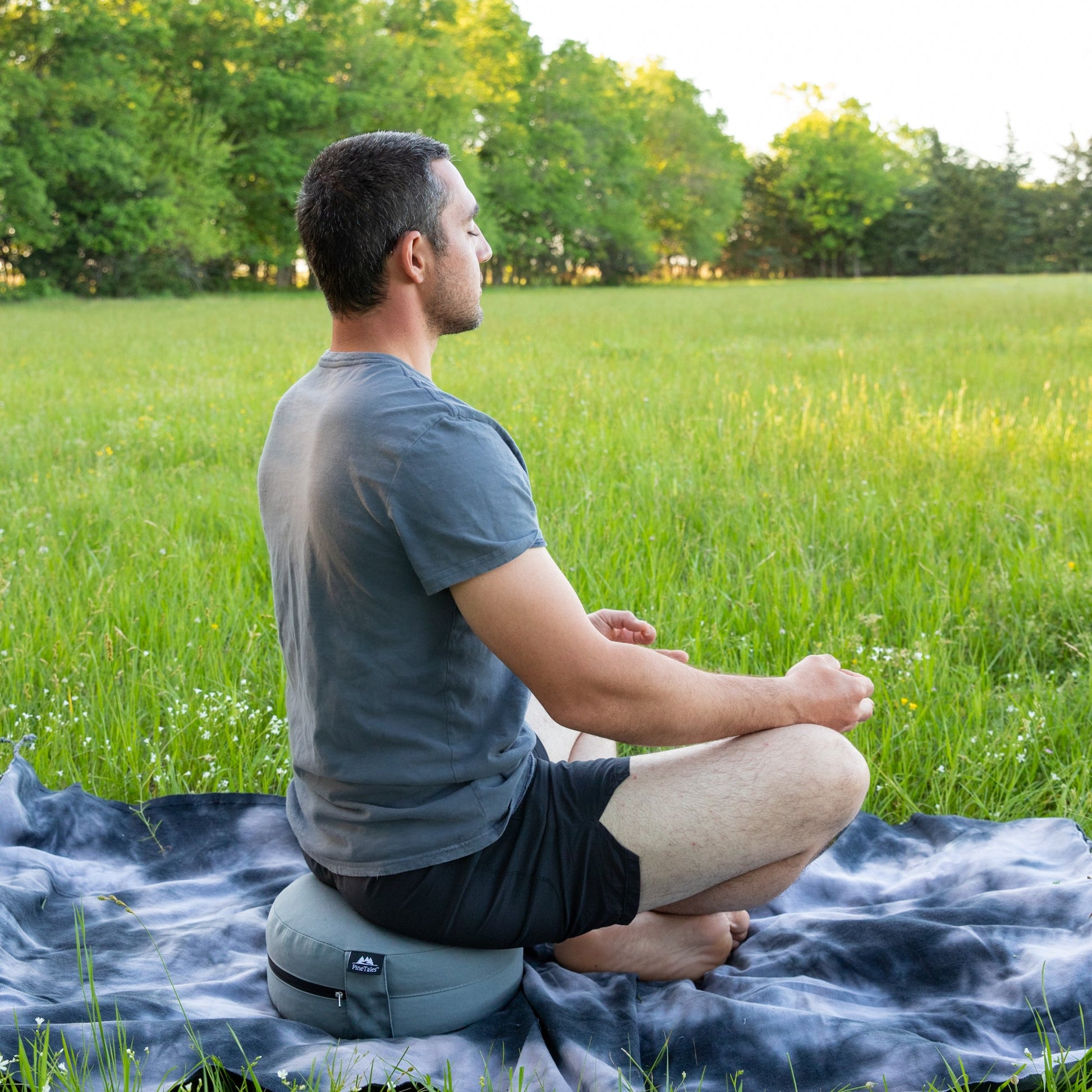 Outdoor Meditation Pillow by PineTales being used outside