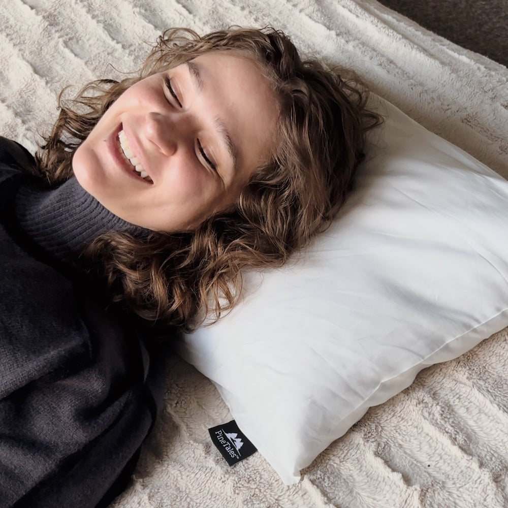 Woman Sleeping on her back on The Signature Sobakawa Buckwheat Pillow with Cotton Twill Shell and a Custom Fit Egyptian Cotton Cover