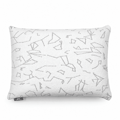 Overhead shot of signature buckwheat pillow showcasing detailed celestial design stitching of the cool-touch side of the pillow cover